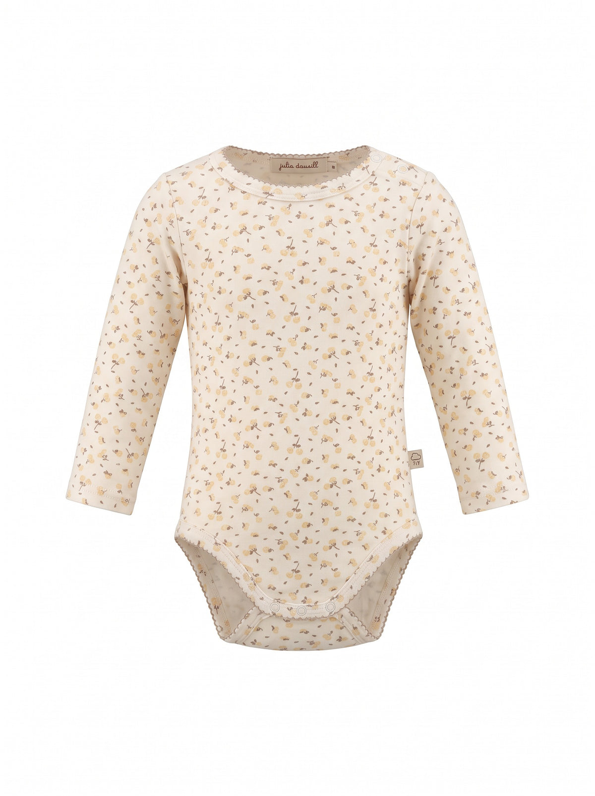Child wearing a soft cotton floral long-sleeve piece with shoulder buttons and a bodysuit hem.
