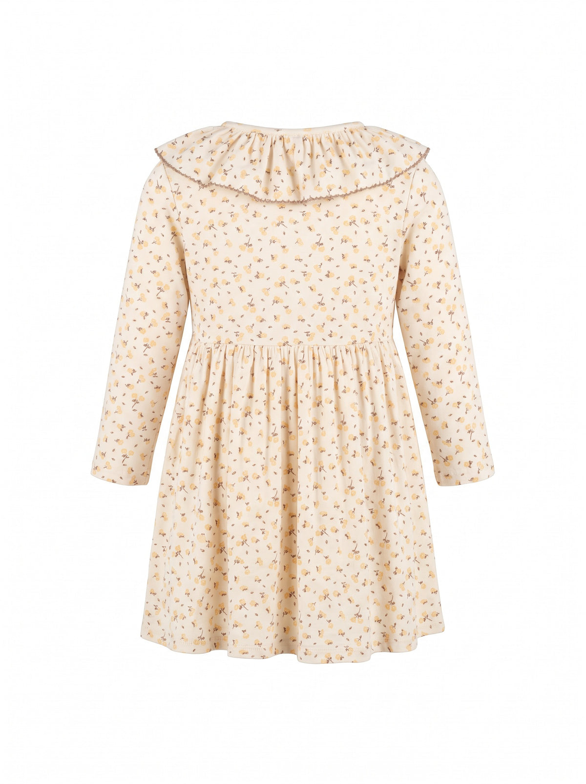 Child wearing a breathable cotton jersey style with a ruffled neckline, long sleeves, gathered waist, and all-over print.