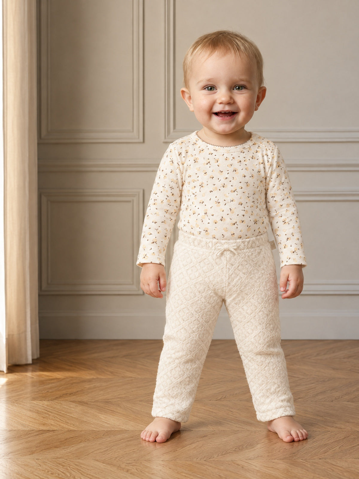 Kids' ankle-length fitted leggings with a soft floral print and elastic waistband.