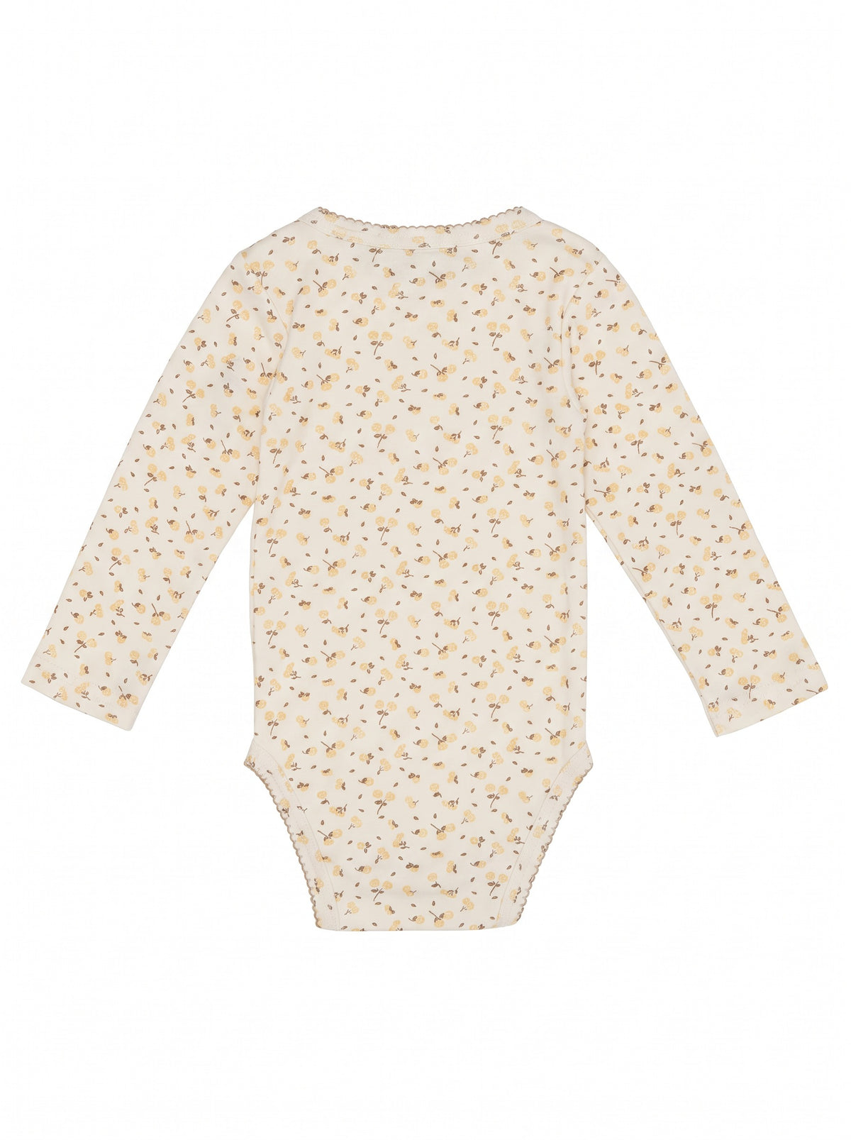 Child wearing a soft cotton floral long-sleeve piece with shoulder buttons and a bodysuit hem.
