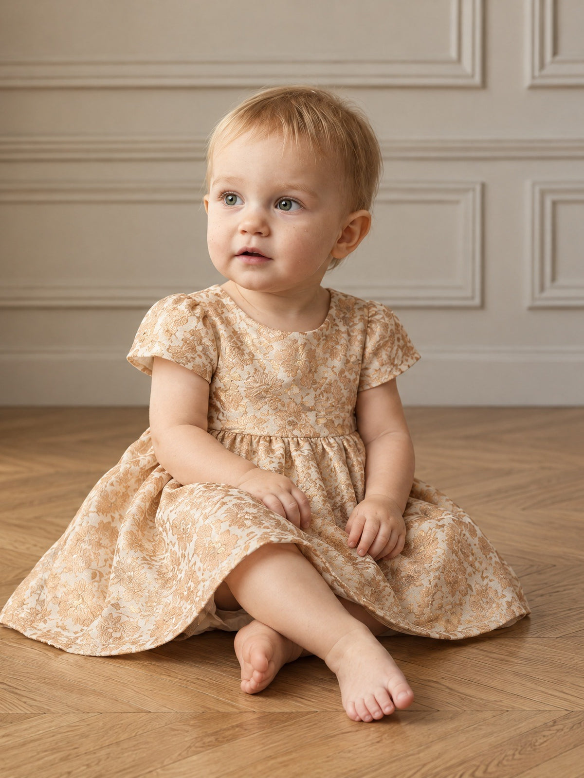 Girls' metallic floral pleated A-line mini style with short sleeves and a gathered waist.
